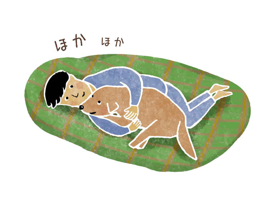 疲れやだるさを感じてうつむく女性の写真