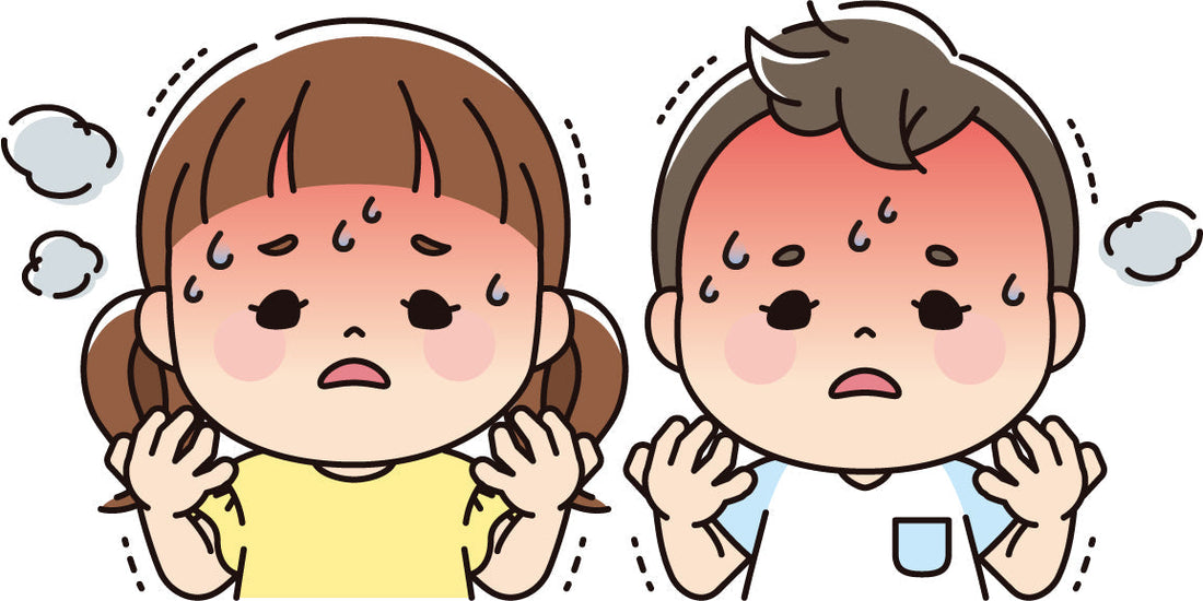 暑さで体に熱がこもりつらそうにしている女性の写真